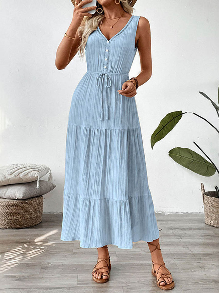 Robe longue boutonnée plissée coupe trapèze, taille haute, à taille nouée, à col en V, couleur unie