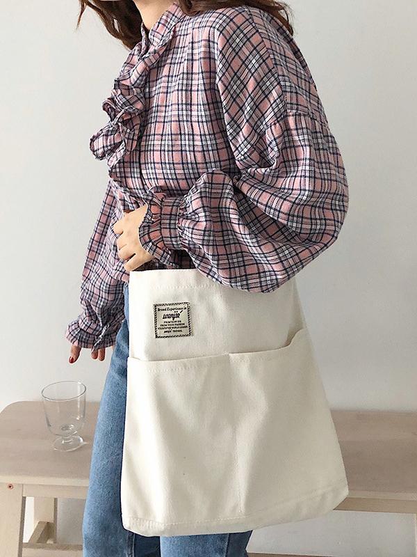 Sac à main simple en toile de couleur unie avec poches