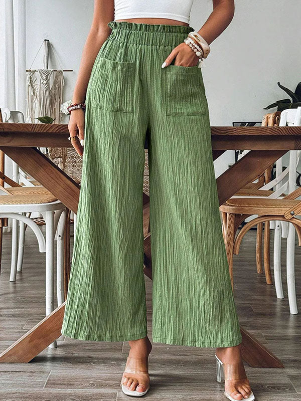 Pantalon ample plissé à jambes larges, à taille élastique, à poches, à empiècements, couleur unie