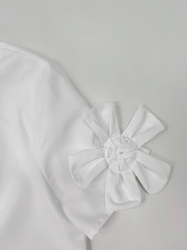 Robe chemise ample plissée coupe trapèze, à empiècements, à col revers, couleur unie