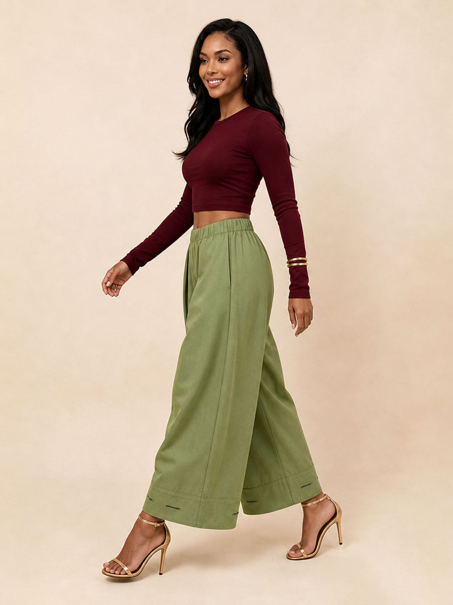 Pantalon plissé boutonné ample à poches, à taille élastique, à jambes larges, couleur unie
