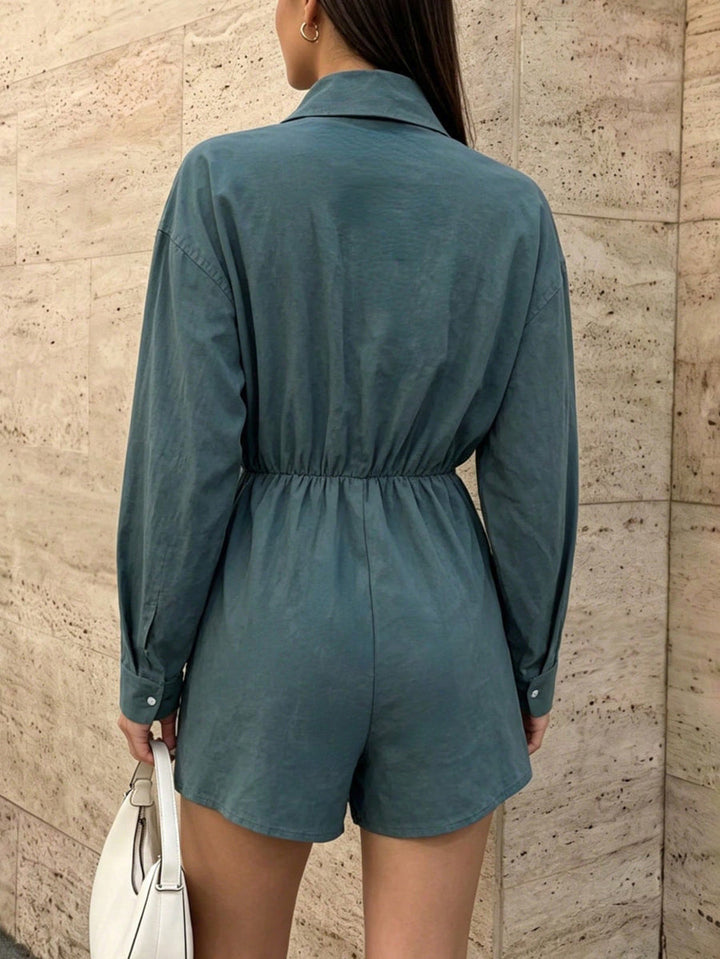 Combishort boutonné à poches, à taille élastique, à jambes larges, à manches longues, à col revers, couleur unie