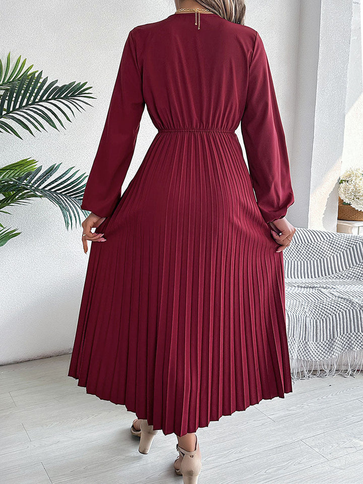 Robe longue plissée coupe trapèze, taille haute, à taille élastique, à col en V, couleur unie