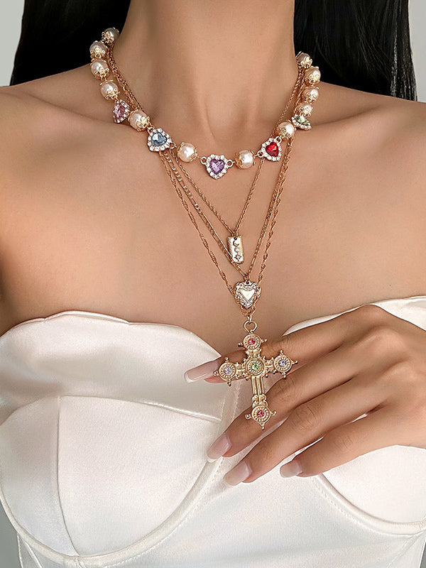 Collier superposé à pompons