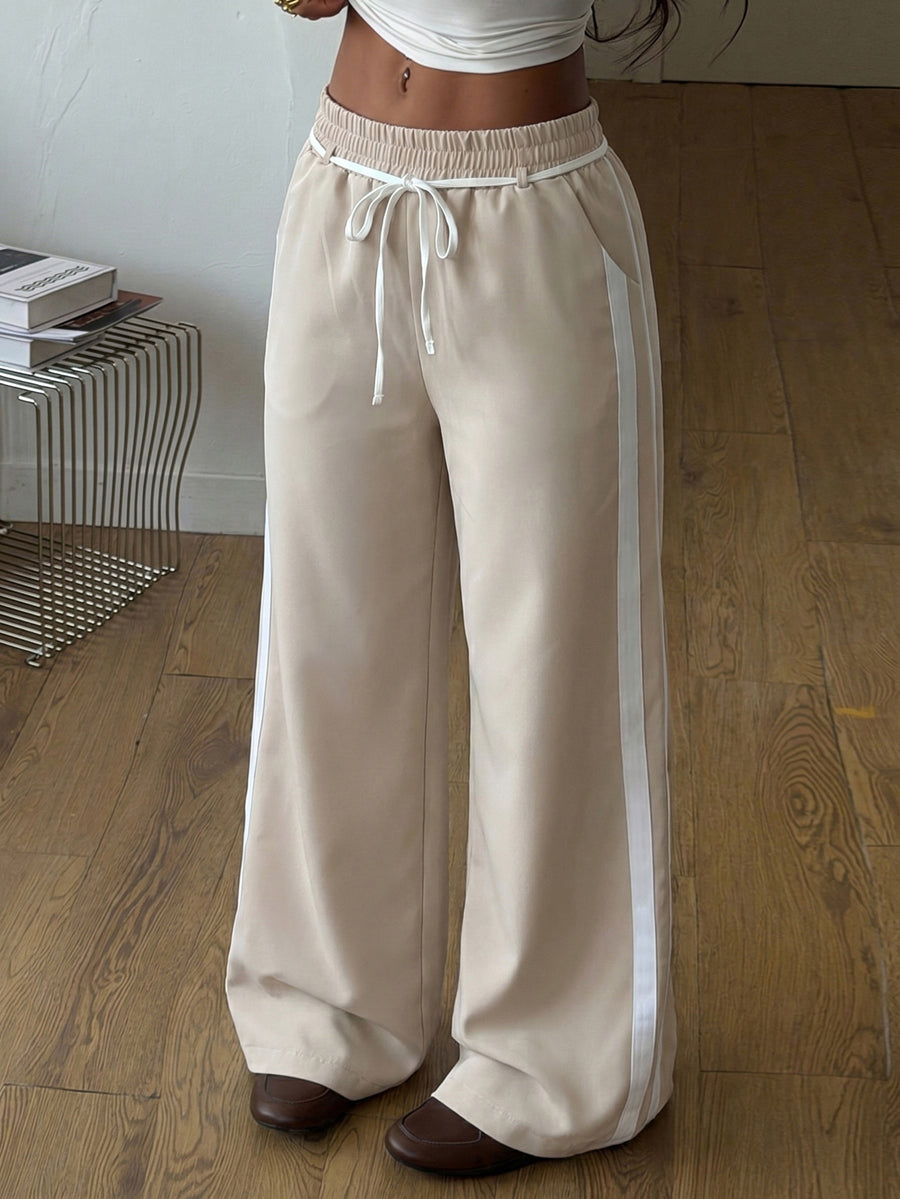 Pantalon à poches, à taille élastique, à jambes larges, couleur unie