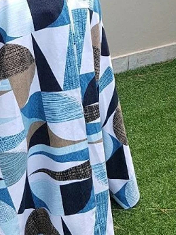 Robe longue plissée coupe trapèze, taille haute, à poches, à col rond, couleur contrastée