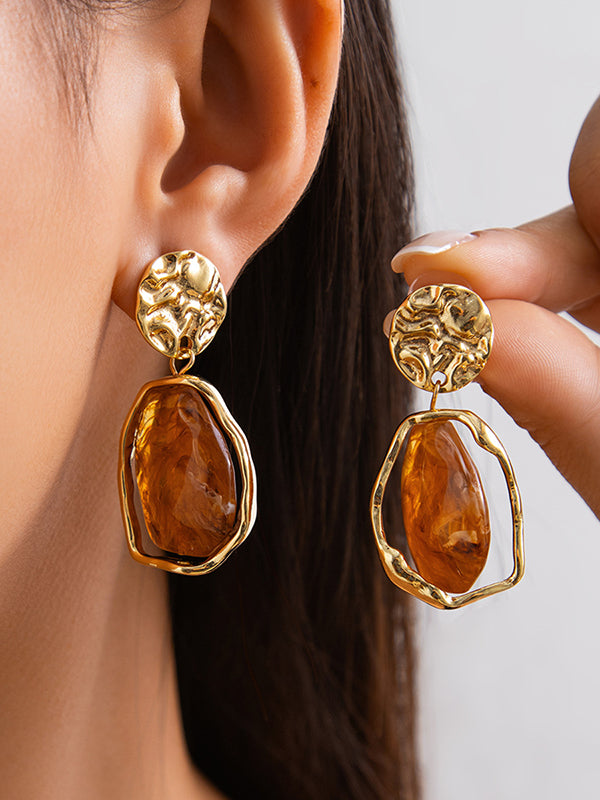 Boucles d'oreilles géométriques brillantes à coupe irrégulière