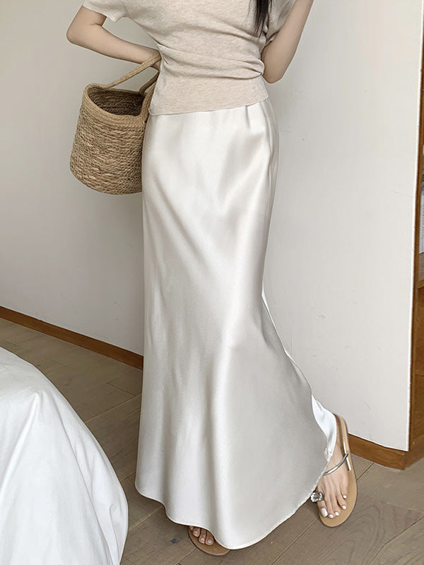 Jupe coupe sirène, à taille élastique, couleur unie