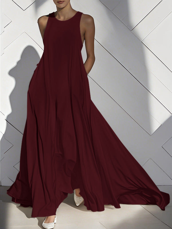 Robe longue ample sans manches, à poches, à empiècements, à col rond, couleur unie