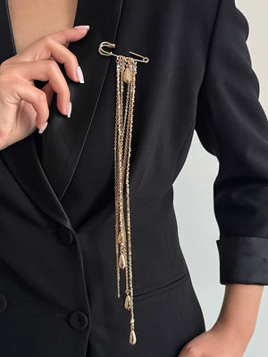 Broche à pompons, en forme de goutte