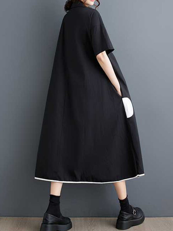 Robe chemise boutonnée fendue devant coupe trapèze, à manches mi-longues, à poches, à pois, à empiècements, à col revers
