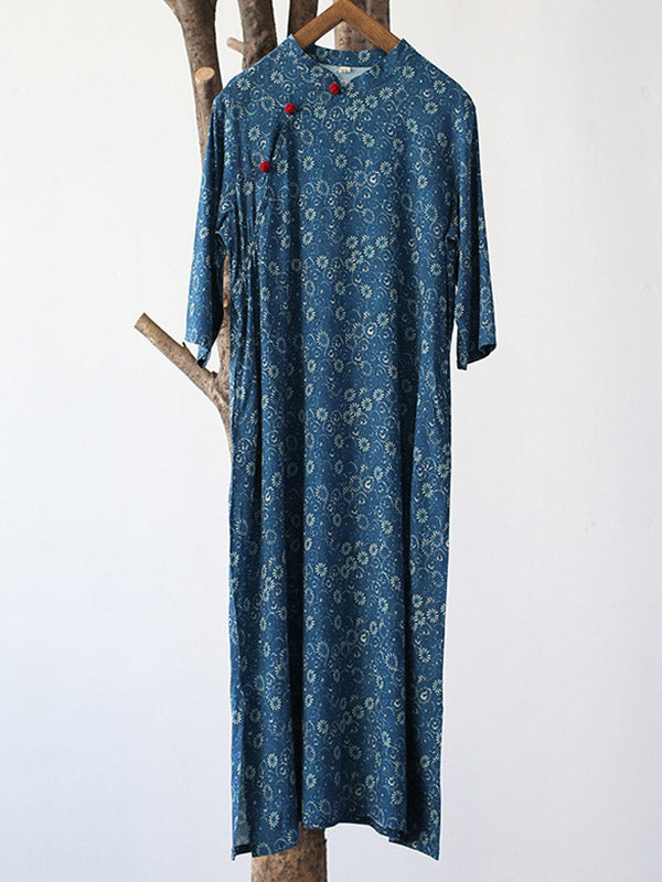 Robe mi-longue originale à col montant et motif floral uni