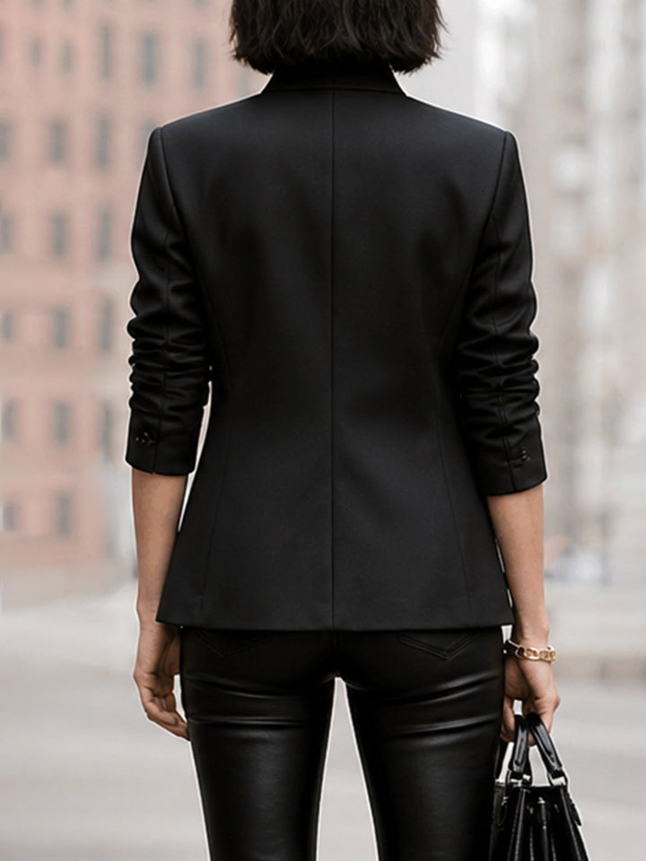 Veste boutonnée asymétrique à manches trois-quarts, à col montant, couleur unie