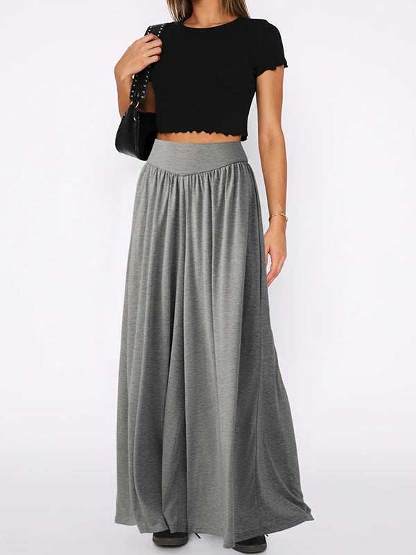 Pantalon ample plissé taille haute, à poches, à empiècements, couleur unie