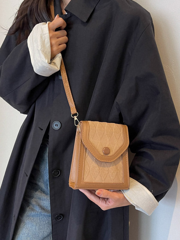Sac bandoulière géométrique à empiècements
