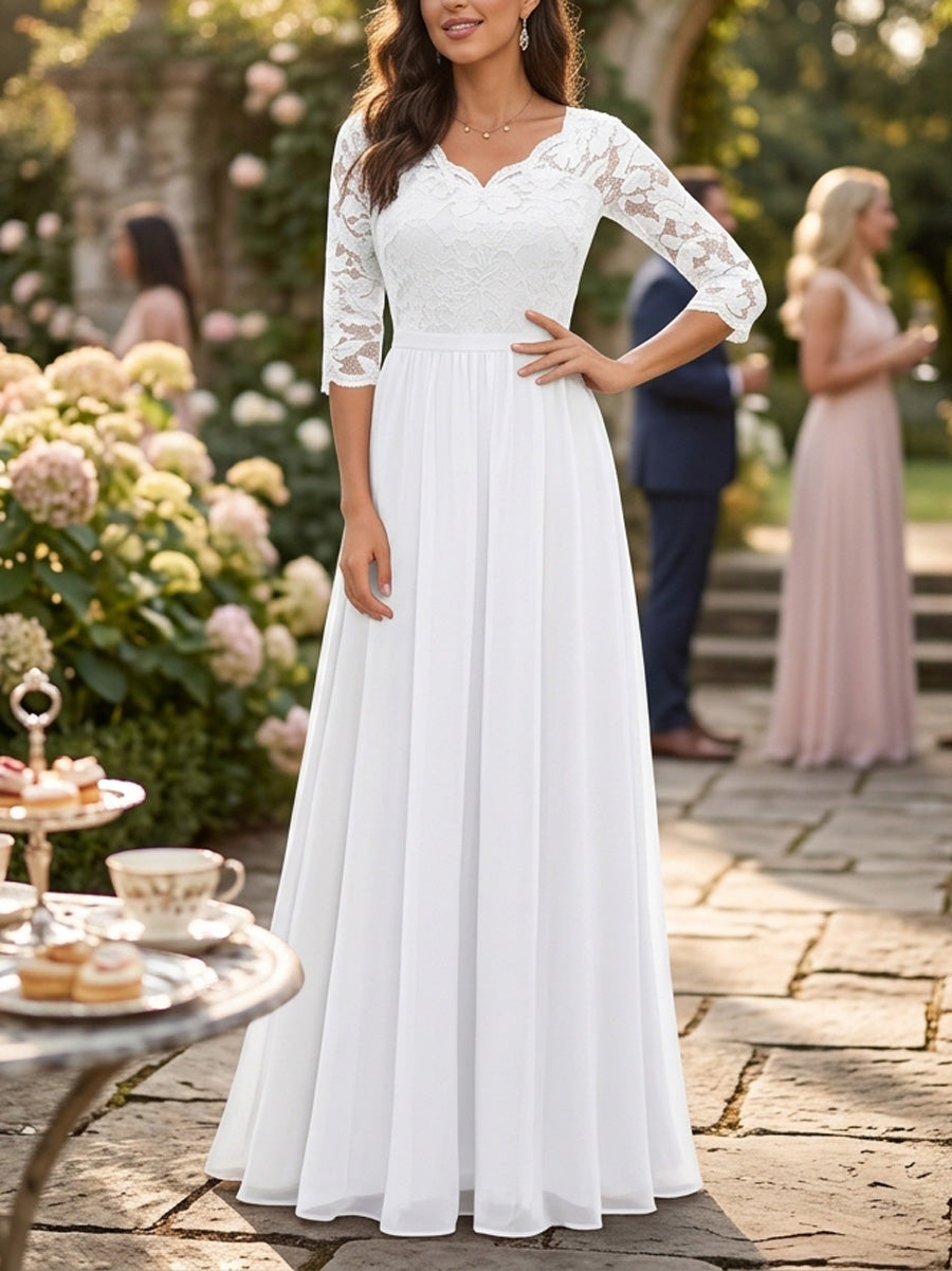 Robe longue plissée transparente coupe trapèze, taille haute, à empiècements, à col en V, couleur unie