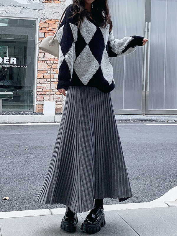 Jupe plissée coupe trapèze, taille haute, couleur unie