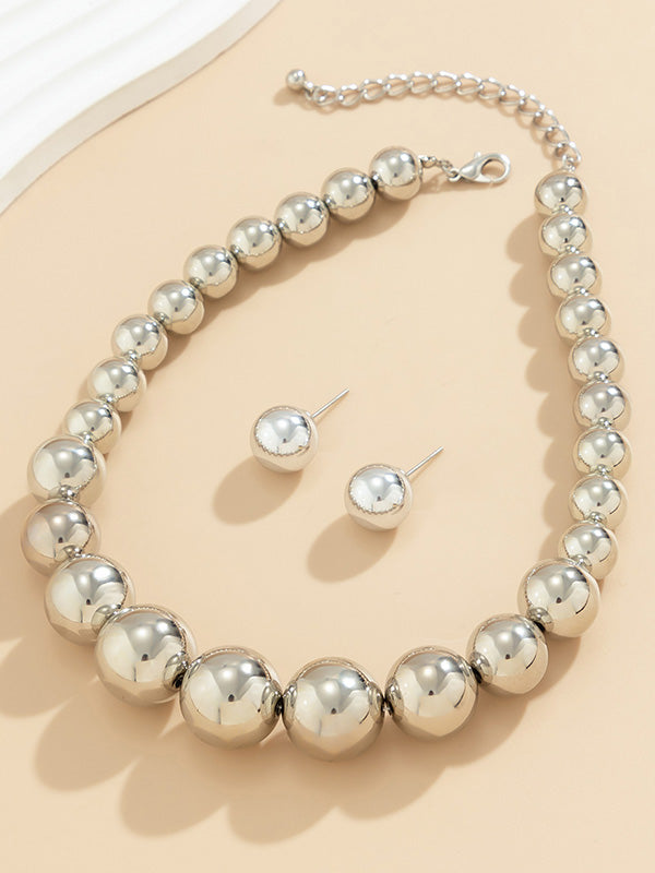 Parure collier et boucles d'oreilles perlée délicate couleur unie