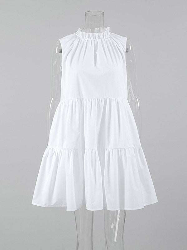 Robe chemise ample plissée volantée coupe trapèze, à empiècements, à col rond, couleur unie