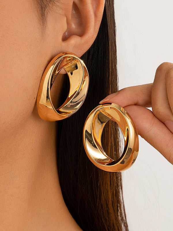 Boucles d'oreilles asymétriques brillantes couleur unie