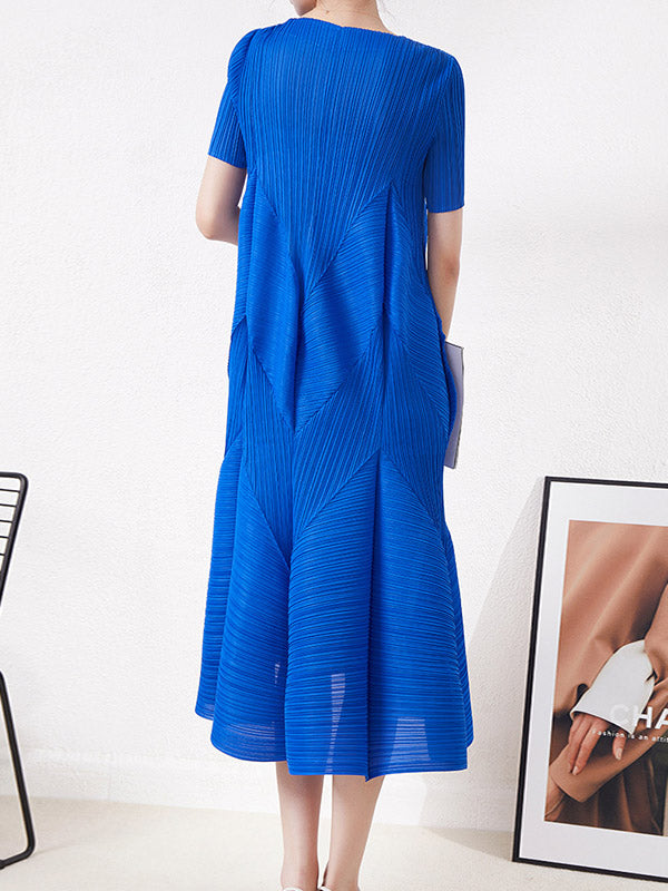 Robe mi-longue ample plissée taille haute, à col rond, couleur unie