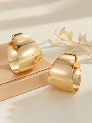 Boucles d'oreilles géométriques brillantes couleur unie