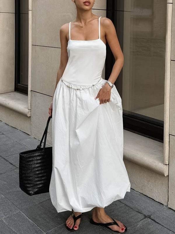 Robe mi-longue ample plissée sans manches, à empiècements, à fines bretelles, couleur unie
