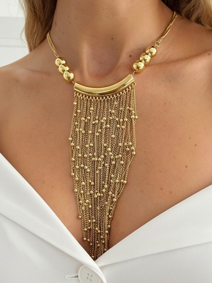 Collier géométrique à pompons