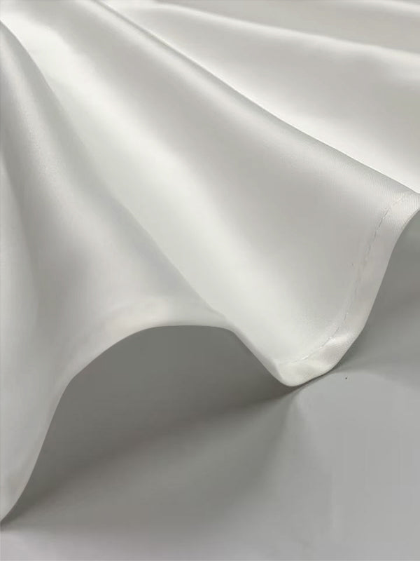 Robe longue ample sans manches, à poches, à empiècements, à col rond, couleur unie