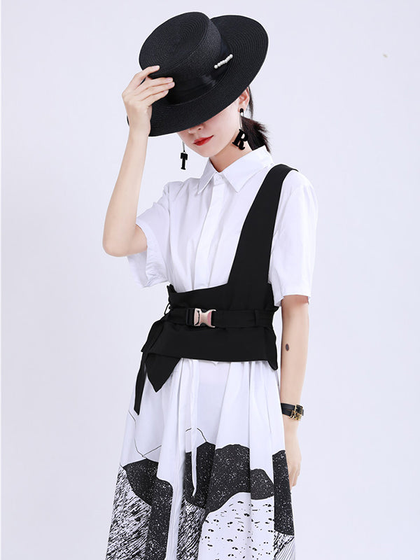 Gilet noir avec boucle de ceinture élégante