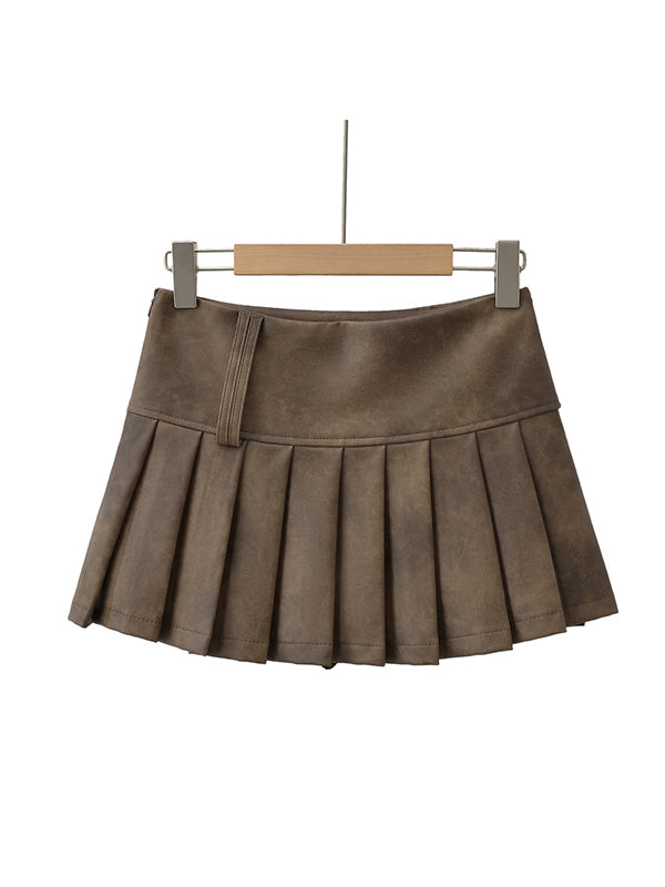 Jupe plissée coupe trapèze, taille haute, couleur unie