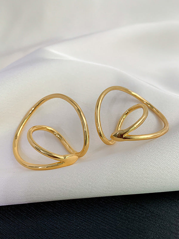 Boucles d'oreilles torsadées chic et irrégulières de couleur unie