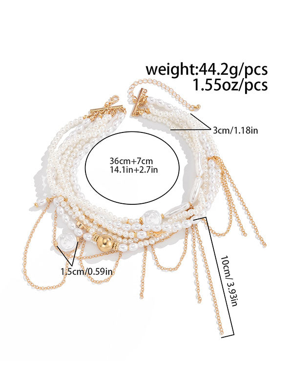 Collier géométrique superposé à pompons