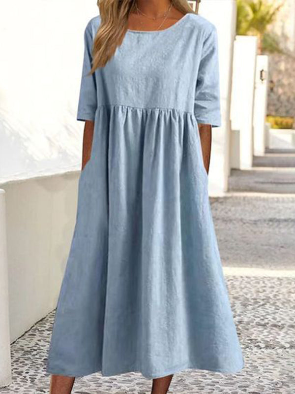 Robe mi-longue plissée coupe trapèze, à manches mi-longues, à poches, à col rond, couleur unie