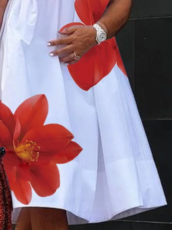 Robe mi-longue ample plissée coupe trapèze, à imprimé floral, à col en V