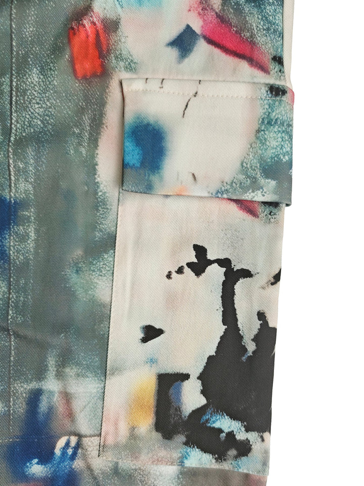 Bas de pantalon en Jean taille haute, jambe large, boutonné, couleur contrastée, poches imprimées graffitis