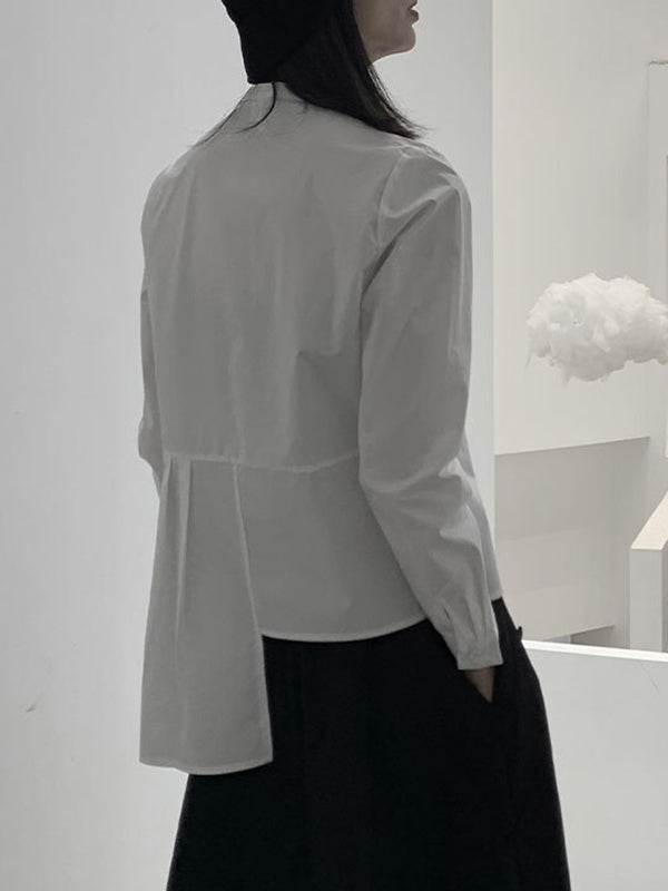 Chemisier asymétrique boutonné plissé à manches longues, à col rond, couleur unie
