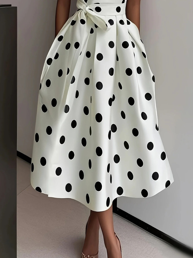 Robe portefeuille sans manches pour femmes avec décolleté en V, motif à pois, ceinture à nouer et jupe midi