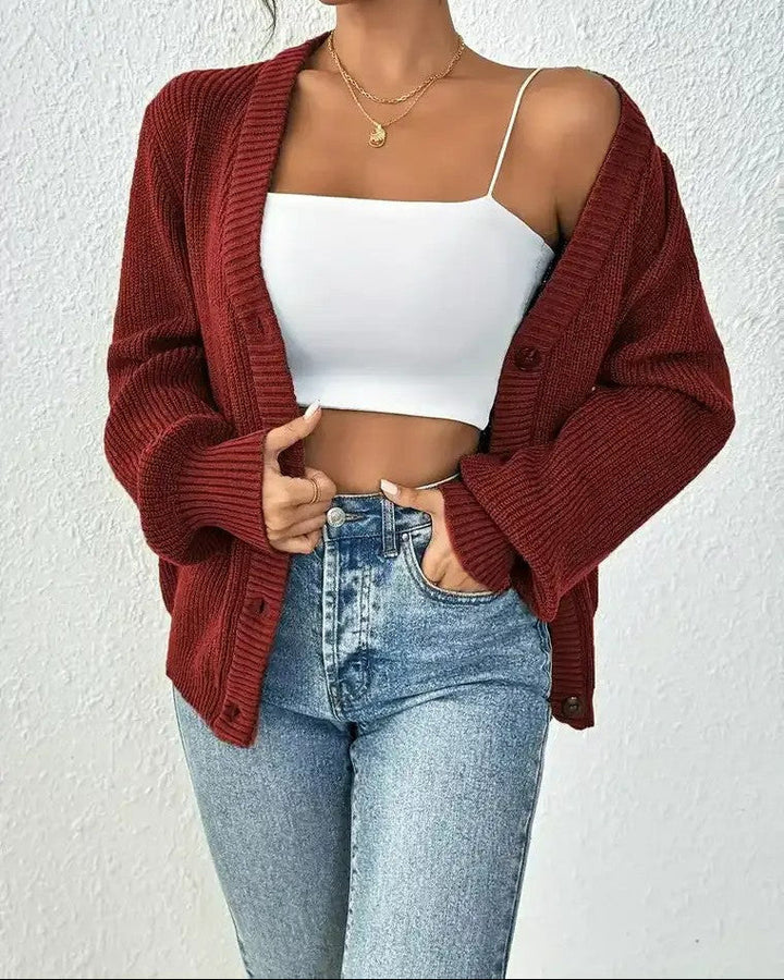 Gilet en tricot côtelé pour femmes avec décolleté en V, fermeture à boutons et manches ballon