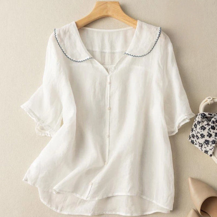 Blouse chemise pour femmes avec col Claudine et boutonnière continue et manches à volants
