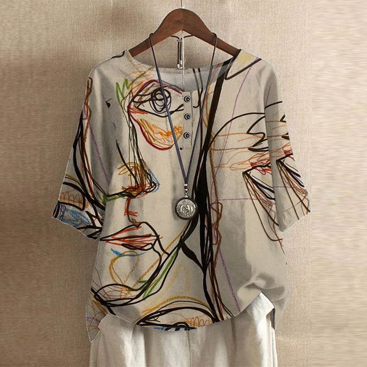 Blouse chemise pour femmes avec encolure ronde, manches mi-longues, patte de boutonnage et poignets retroussés