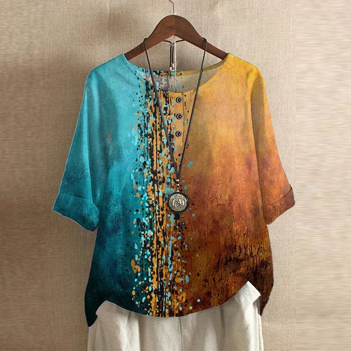 Blouse chemise pour femmes avec encolure ronde, manches mi-longues, patte de boutonnage et poignets retroussés