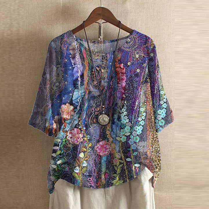 Blouse chemise pour femmes avec encolure ronde, manches mi-longues, patte de boutonnage et poignets retroussés