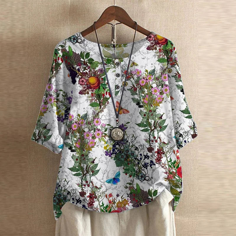 Blouse chemise pour femmes avec encolure ronde, manches mi-longues, patte de boutonnage et poignets retroussés