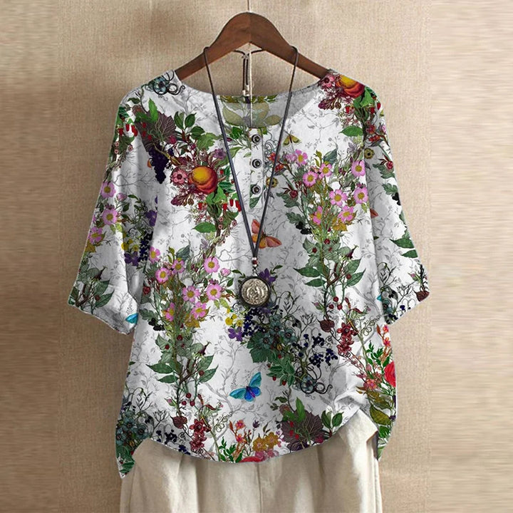 Blouse chemise pour femmes avec encolure ronde, manches mi-longues, patte de boutonnage et poignets retroussés
