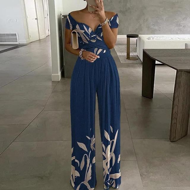 Combinaison femme avec décolleté off-shoulder et top croisé à jambes larges