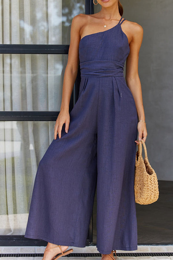 Combinaison pour femmes avec bretelle asymétrique et jambes larges