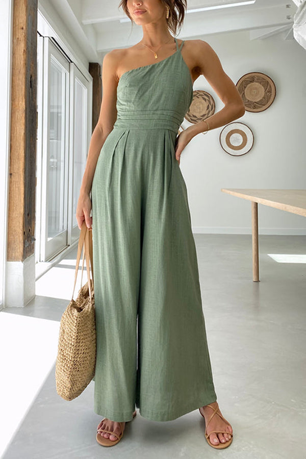 Combinaison pour femmes avec bretelle asymétrique et jambes larges