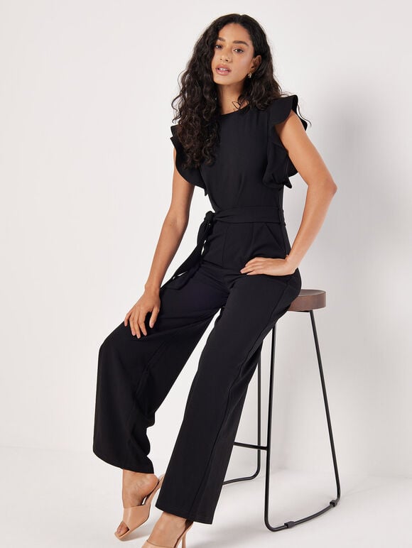 Combinaison pour femmes avec manches volantées et ceinture à nouer