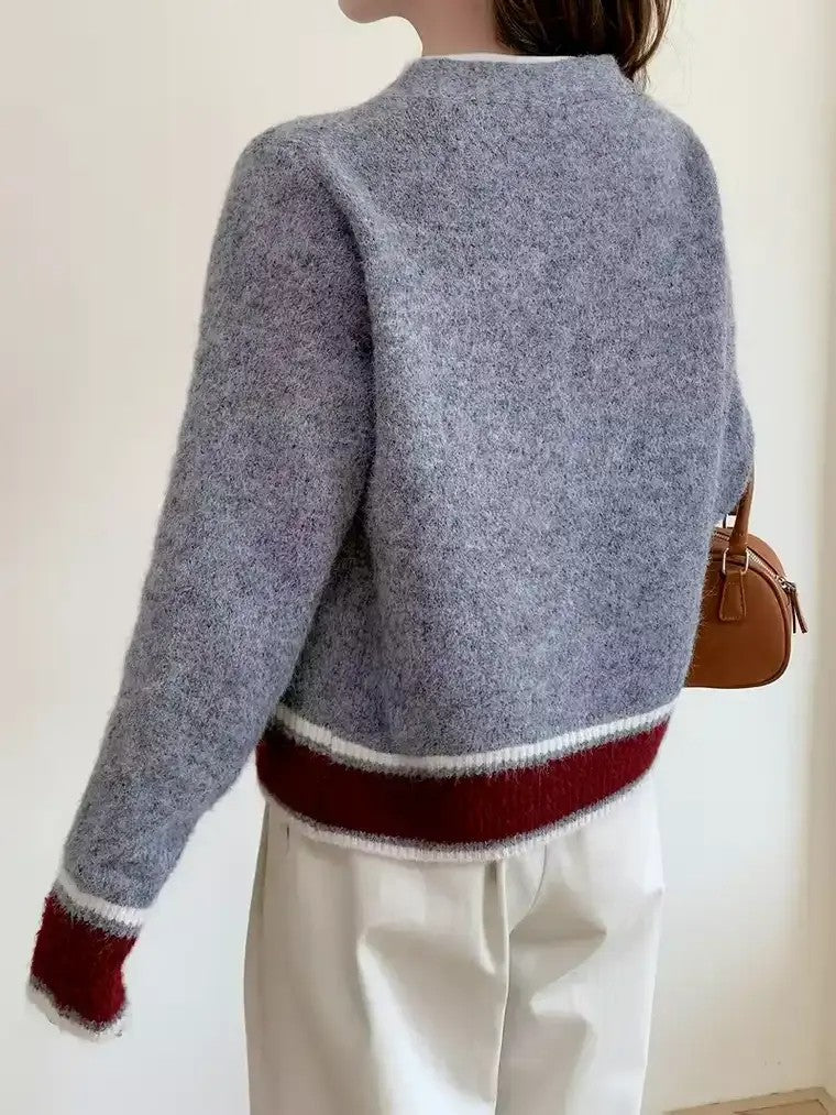 Cardigan à manches longues pour femmes avec décolleté en V et patte de boutonnage à trois boutons en surface chinée